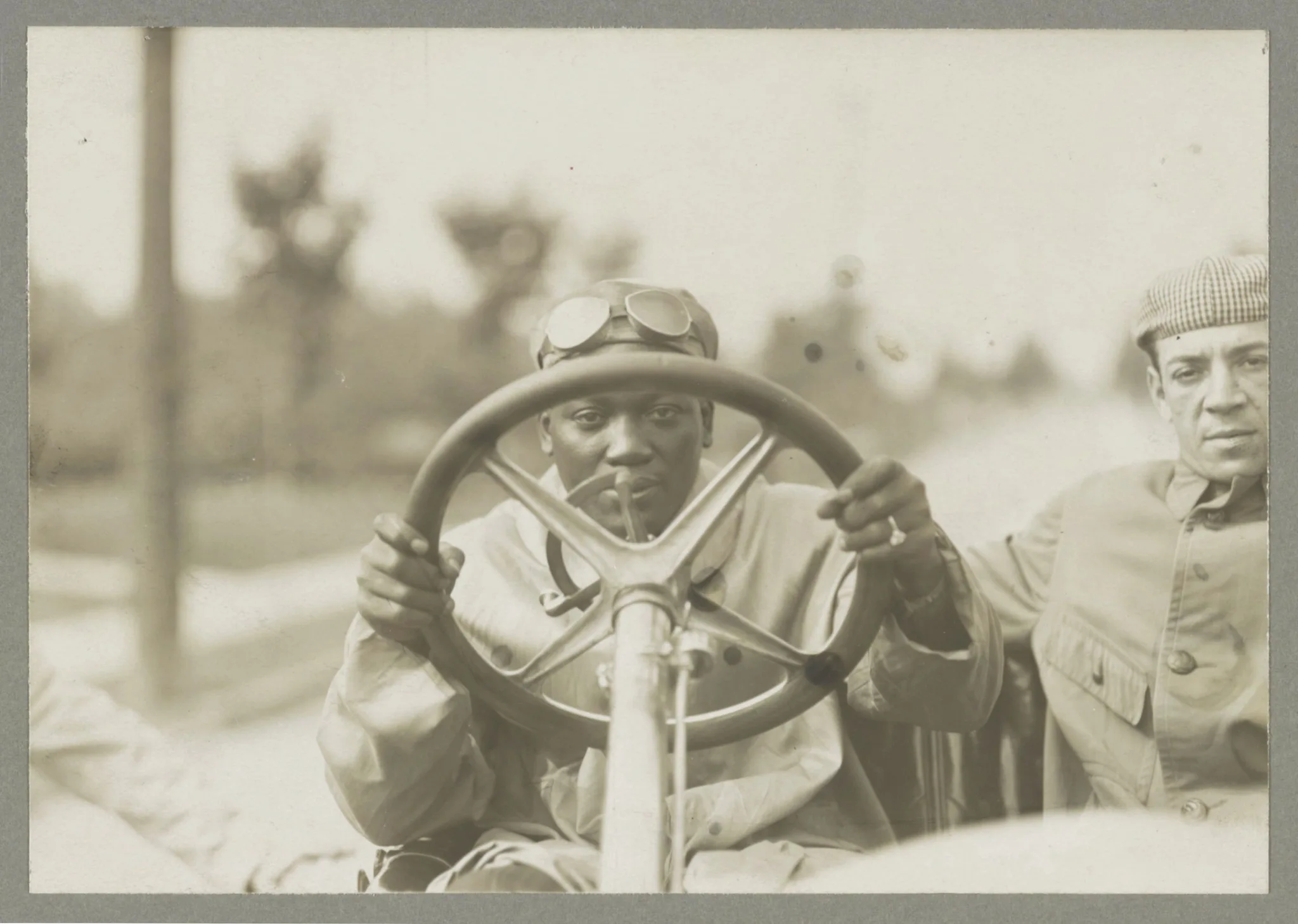 Jack Johnson at the wheel of his 90 horsepower Thomas Flyer